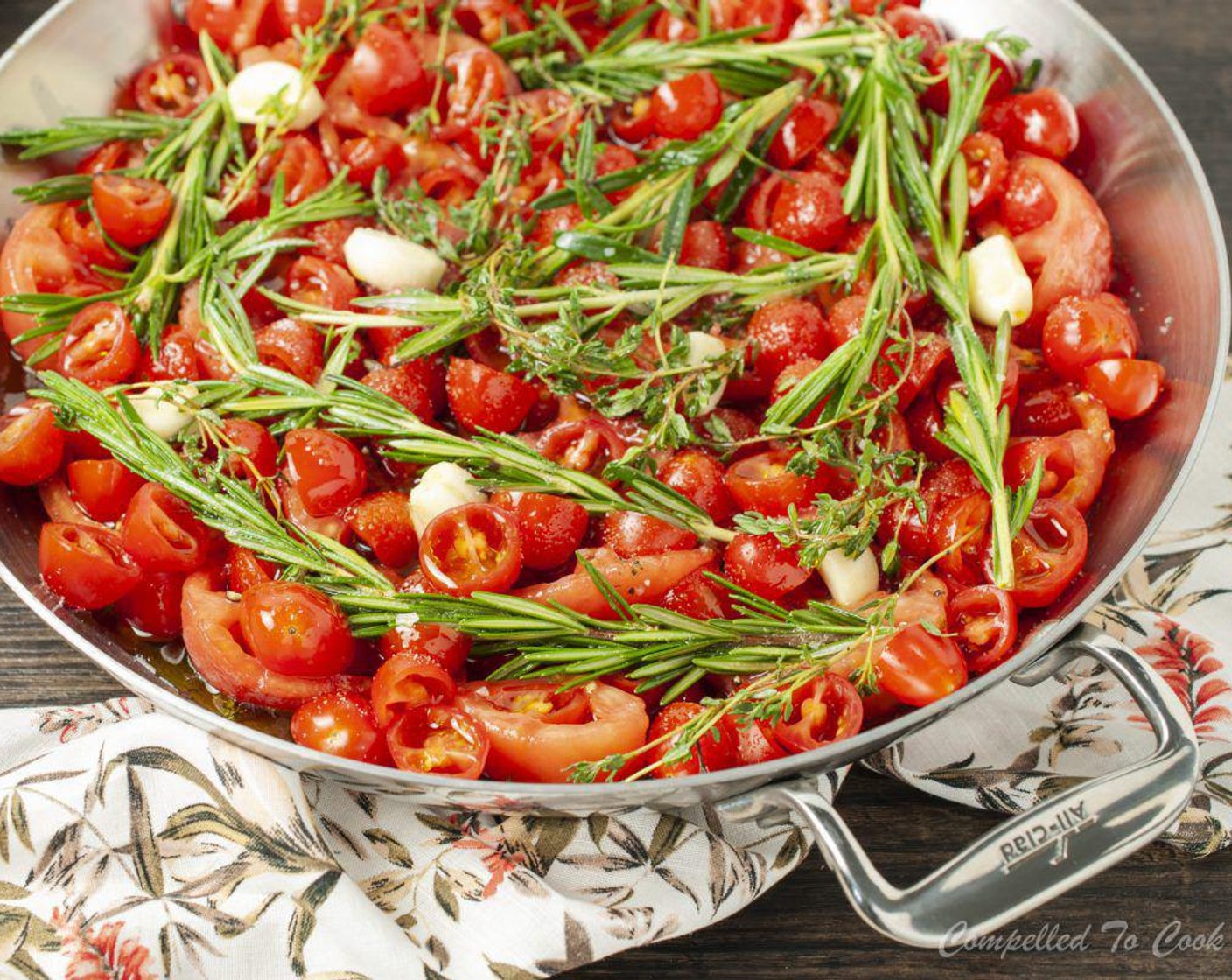 step 9 Sprinkle the mix over tomatoes and herbs. Drizzle Olive Oil (2 cups) evenly over tomatoes.