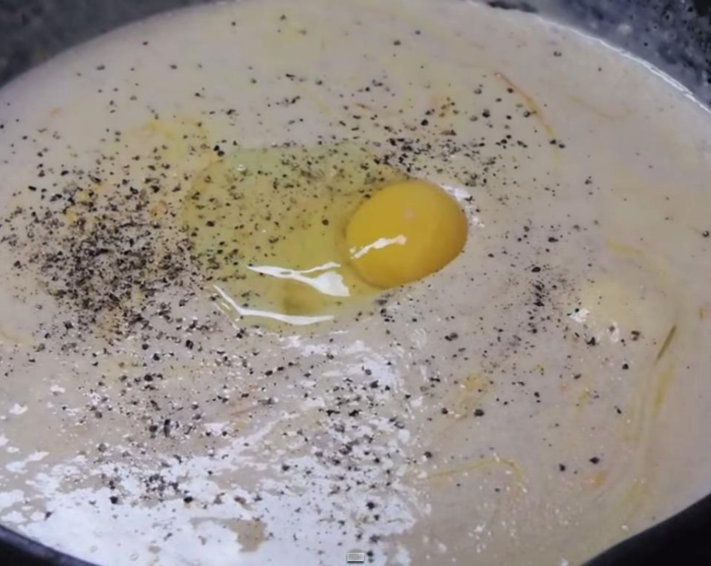 step 6 Take the skillet off the heat and stir in the Cheese (5 2/3 cups), pasta water, and Egg (1).