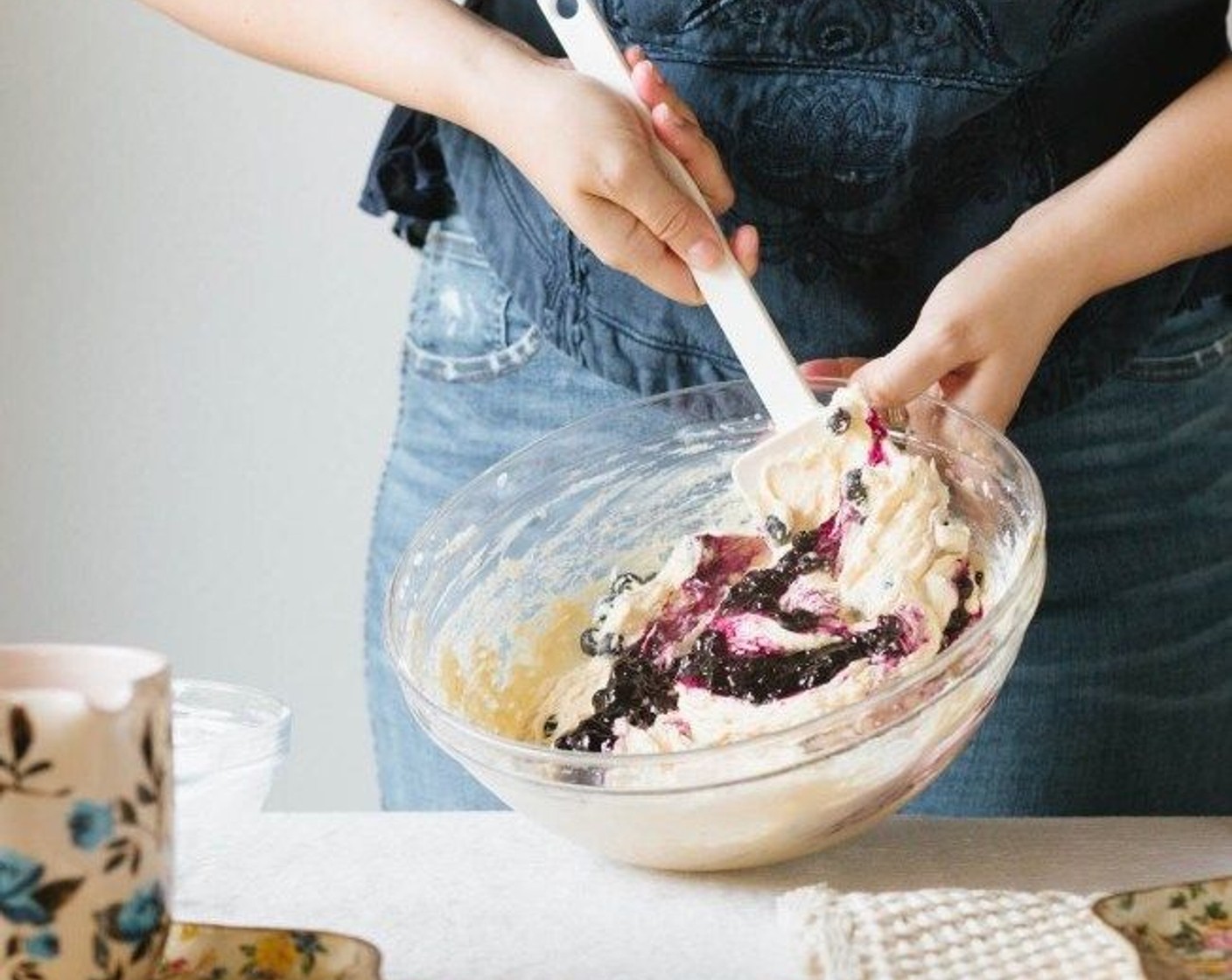 step 5 Fold in the Fresh Blueberry (1 cup) and Blueberry Jam (1/2 cup) until just marbled. Pour into a well-oiled 9-inch cake round.