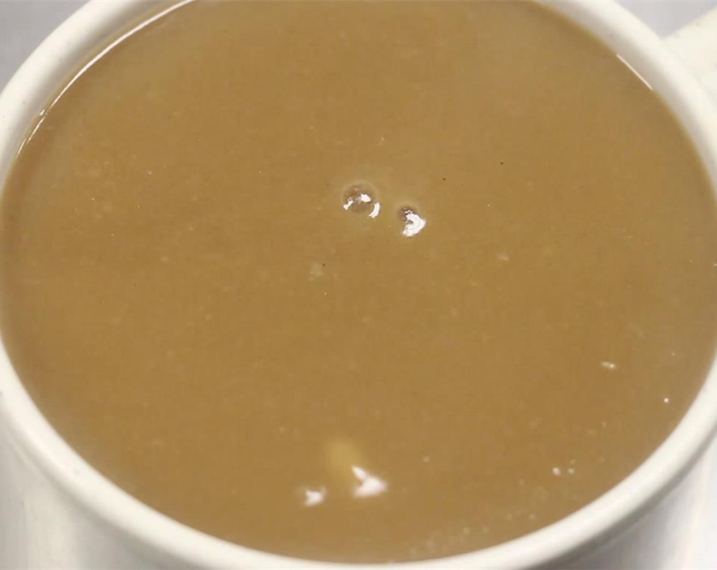 step 7 Transfer gravy into serving bowl and set aside.