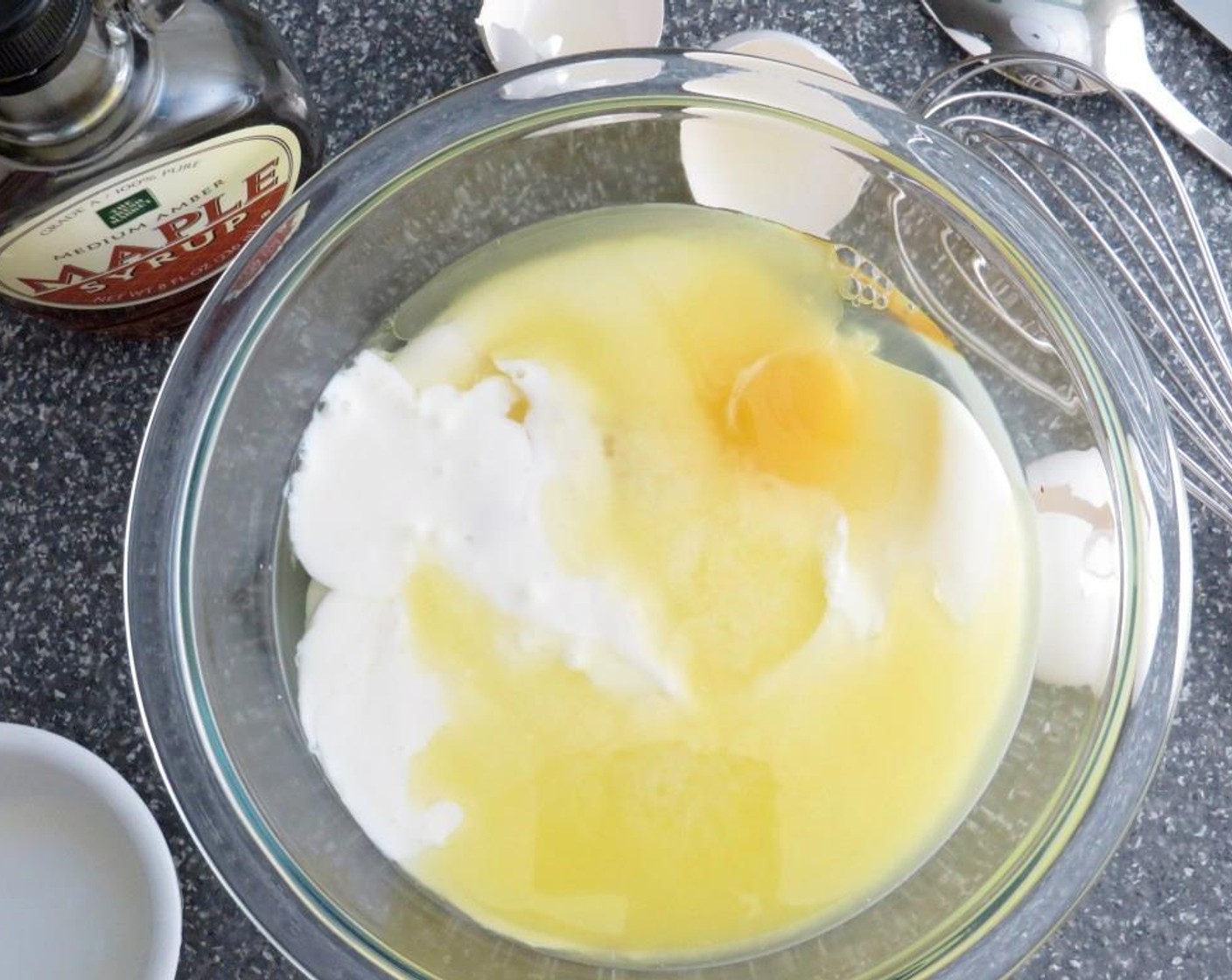 step 5 Shake the Buttermilk (2 cups) well. In a small bowl, add buttermilk, Eggs (2) and Maple Syrup (1/4 cup). Whisk thoroughly to combine wet ingredients.