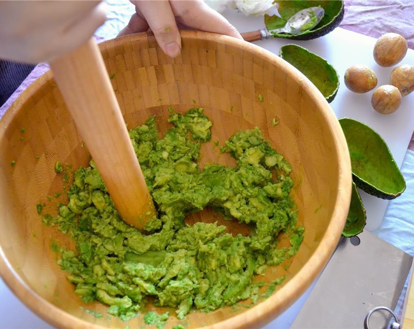 step 7 Mash up the avocados (5) until there are no big chunks left.