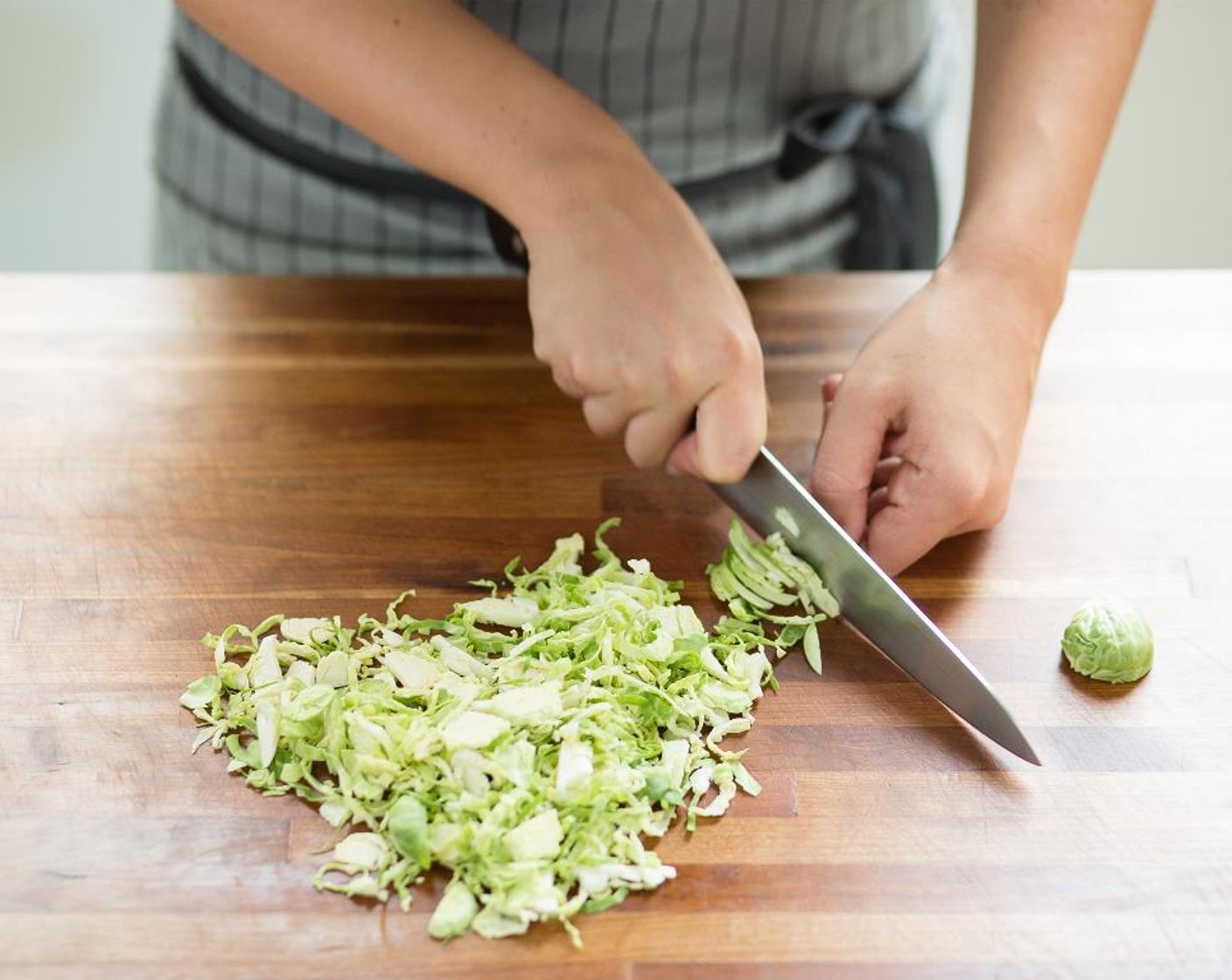 step 2 Cut the Brussels Sprouts (2 1/2 cups) in half and then
thinly slice; set aside.