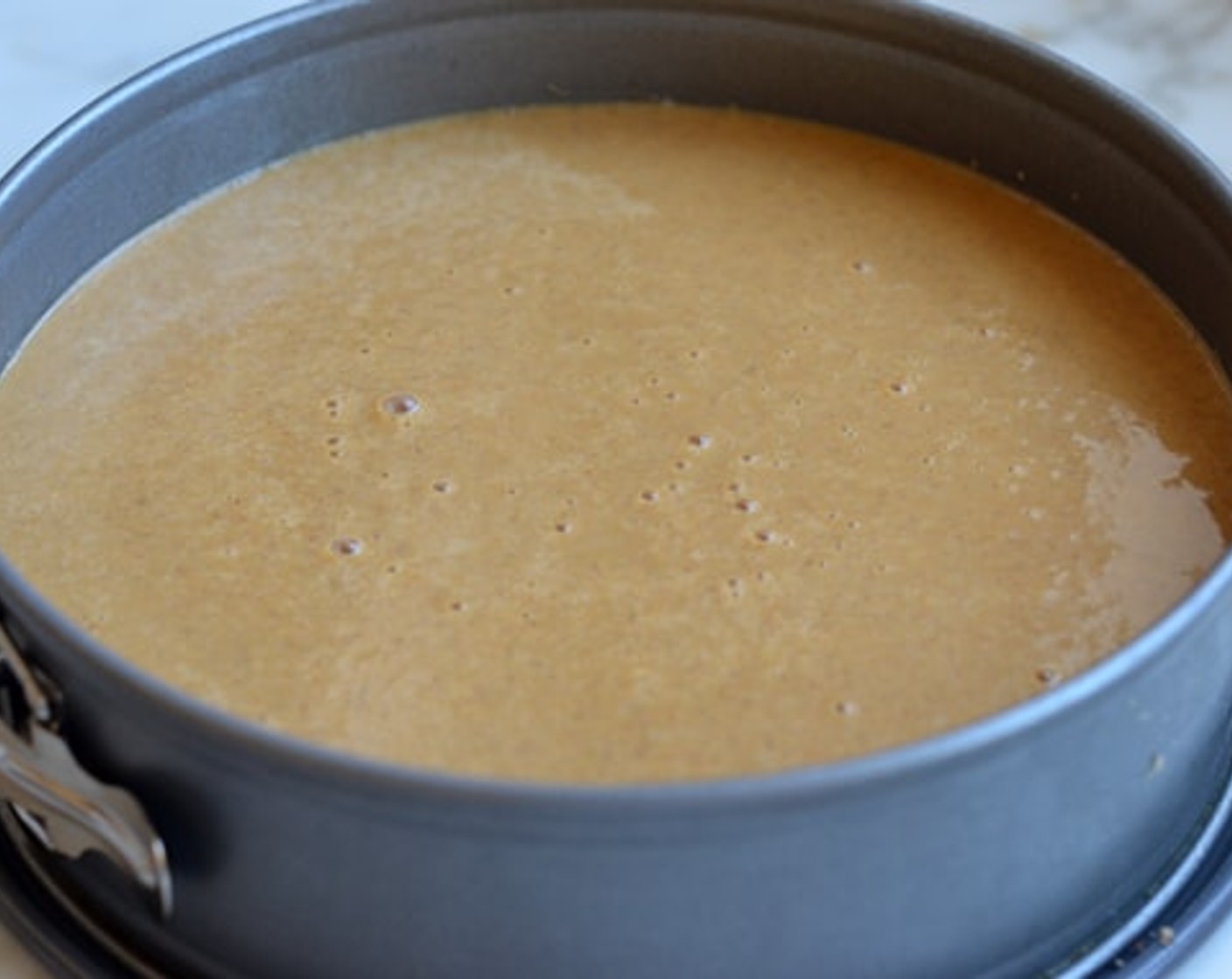 step 8 Pour the filling over the crust in the pan, then bake for 30 minutes.