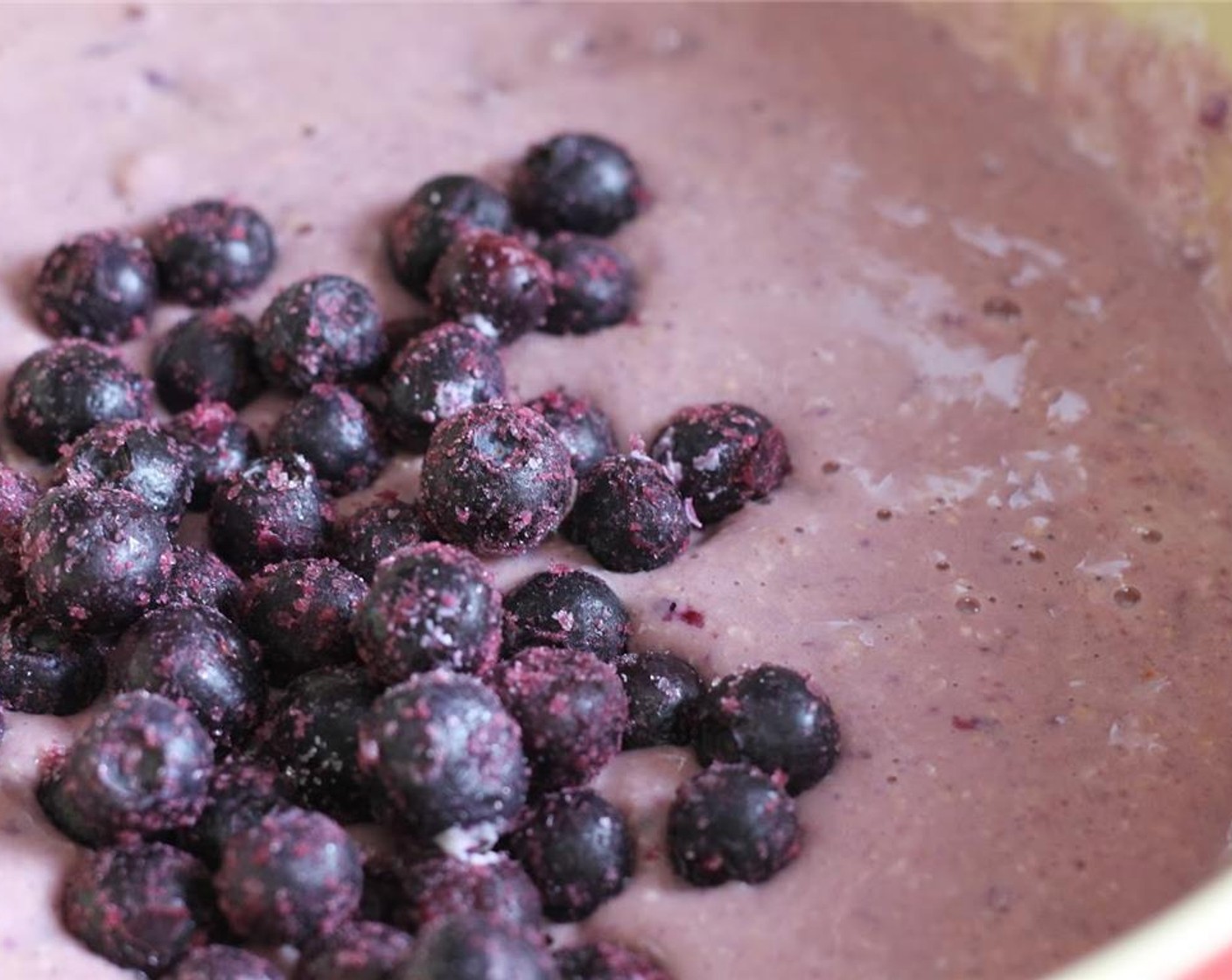 step 6 Add the dry ingredients to the wet ingredients. After they are mixed, fold in Frozen Blueberries (1 cup).