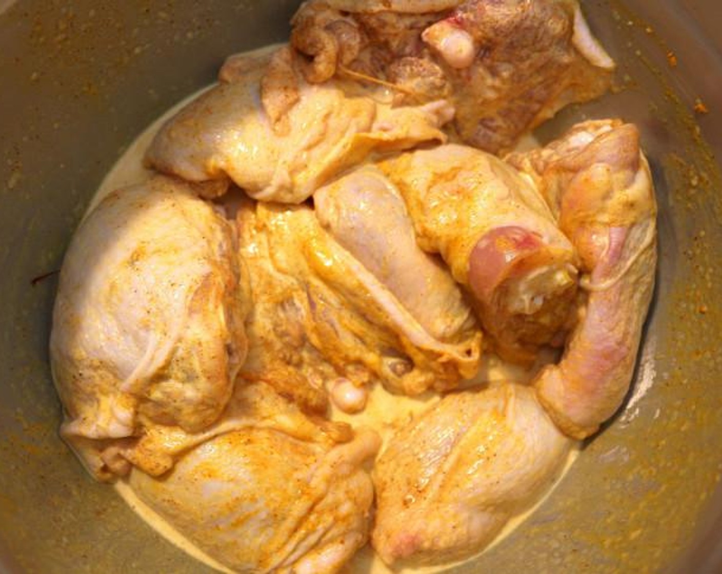 step 1 Marinade Chicken Thighs (8) in Yogurt (1 cup), Garam Masala (1 Tbsp) and 1 Ground Turmeric (1 tsp) overnight.