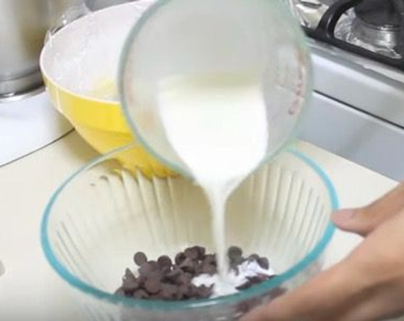 step 10 Heat Heavy Cream (1/3 cup) in the microwave. Pour hot cream into a bowl with the Semi-Sweet Chocolate Chips (2/3 cup) and allow them to melt together.