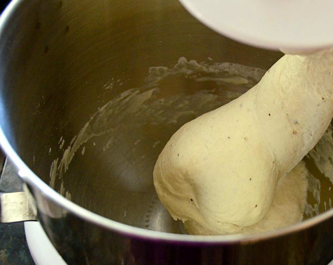 step 4 Add Sea Salt (1 Tbsp) and Freshly Ground Black Pepper (1 tsp) and continue kneading for 2 more minutes.