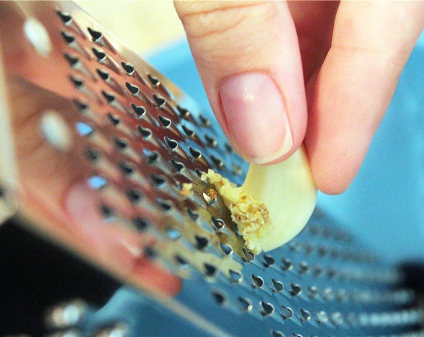 step 3 Grate the Garlic (1 clove).