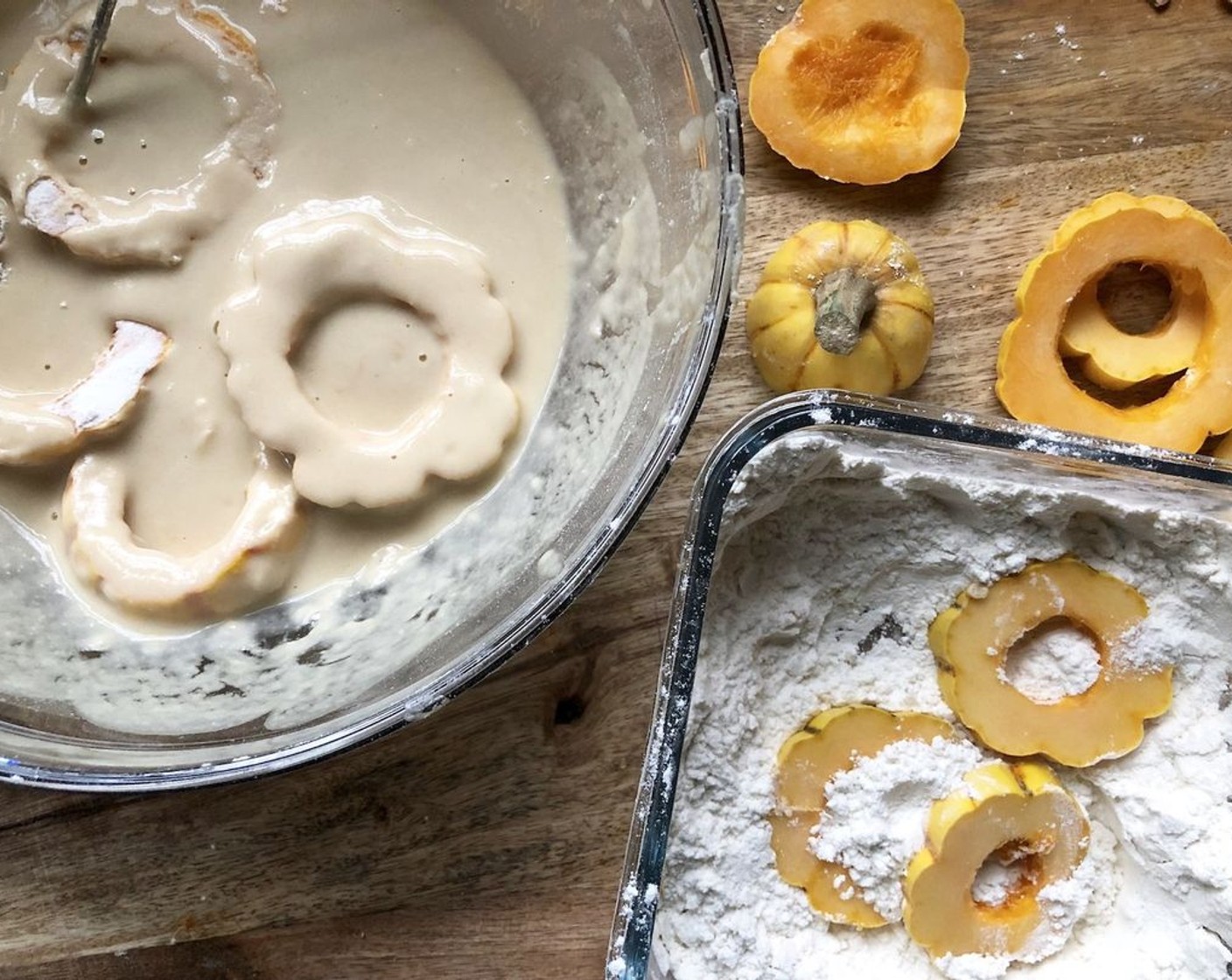 step 5 Place the flour-coated squash rings, a few at a time, in the bowl with the batter. Tap off the excess batter and using a skewer or chopstick, place the battered ring in the pan with the preheated oil.