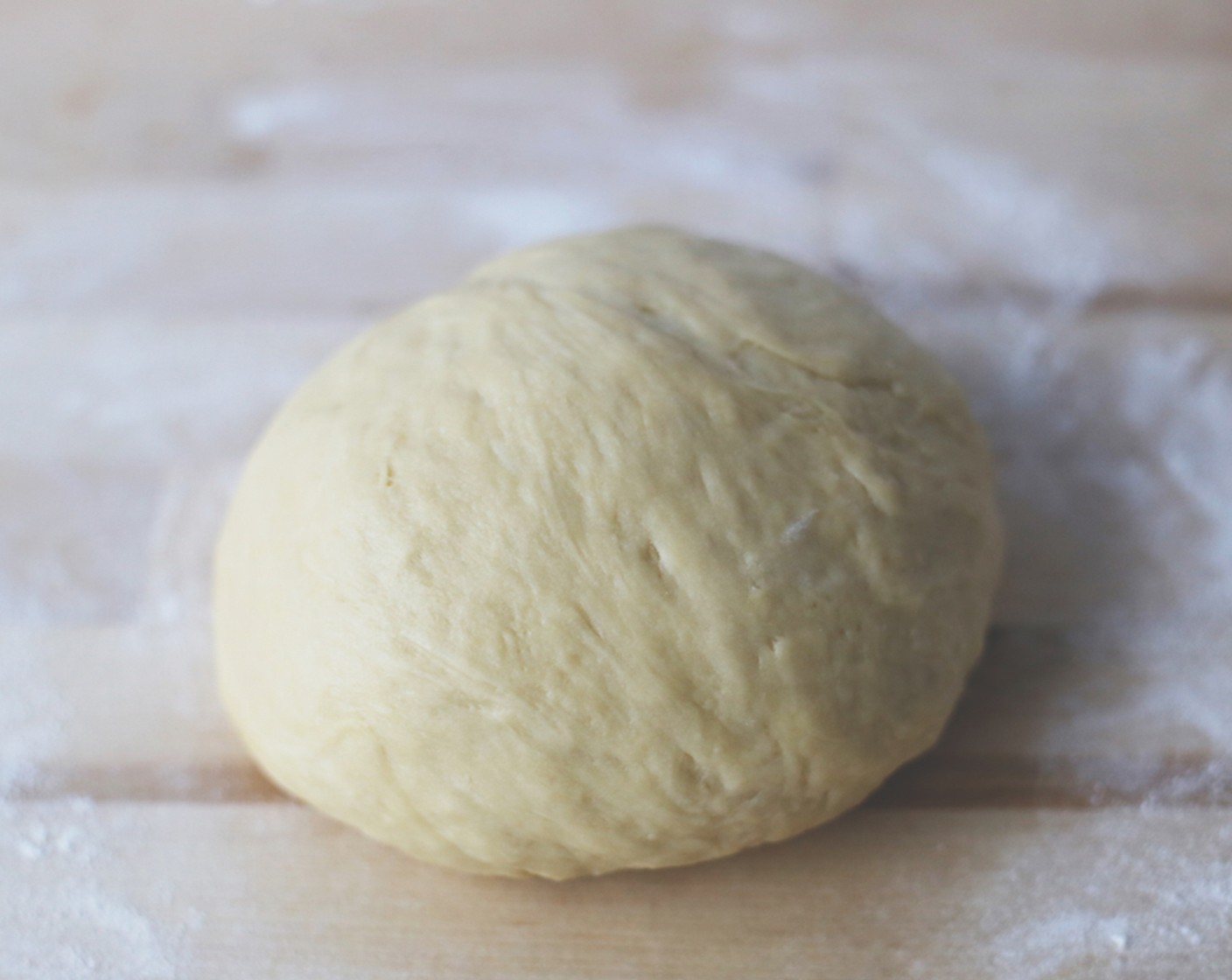 step 11 Remove the dough from the bowl and knead gently for about a minute.