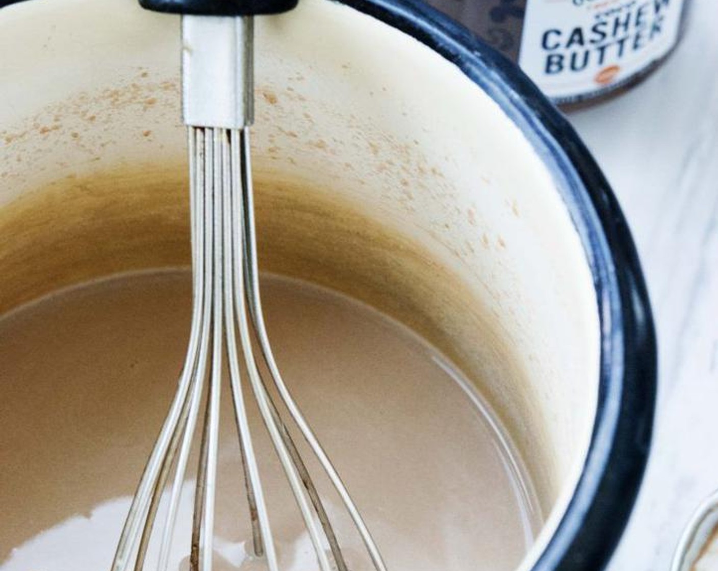 step 1 In a saucepane, bring Filtered Water (1 cup) to a boil and stir in Nut Butter (4 Tbsp), Salt (1 pinch), and Simply Organic Cinnamon, Ground (1 dash).