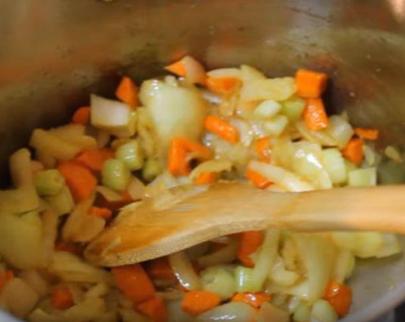 step 1 In a pot over medium-high heat, add Olive Oil (2 Tbsp) and the Onion (1). Saute until nice and translucent. Add the Garlic (to taste), Celery (2 stalks), and Carrots (2). Mix and cook for 5-7 minutes or until the veggies are nice and soft.