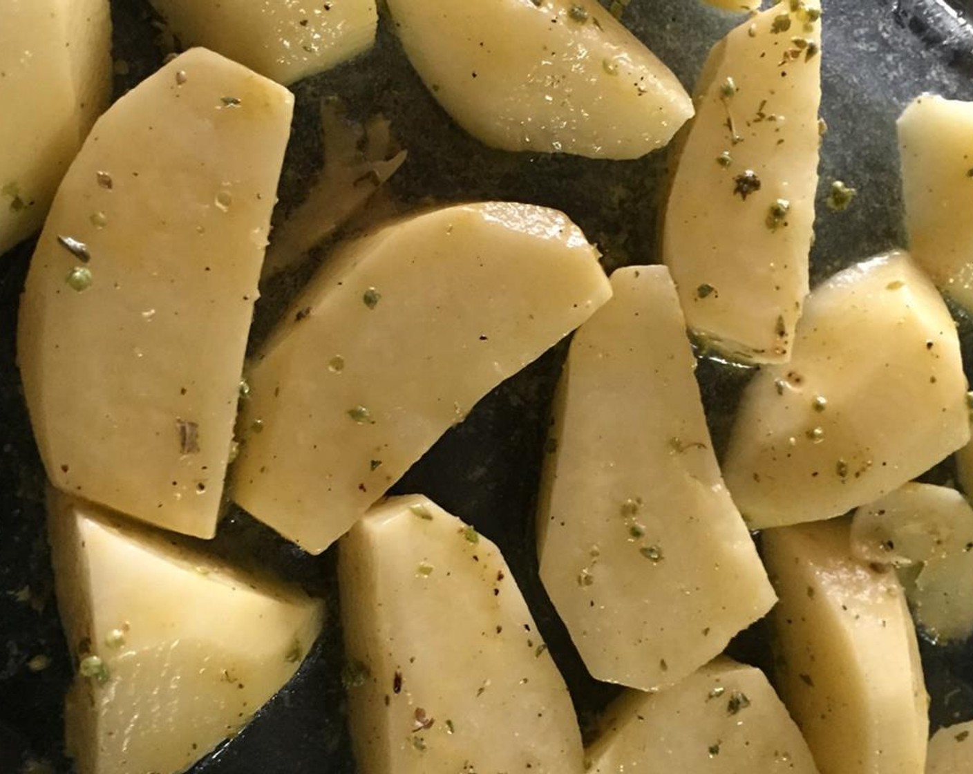 step 2 Place the potatoes in a large mixing bowl. Toss them with Olive Oil (as needed), the juice of the Lemons (2), Ground Cumin (1 pinch), yellow Yellow Mustard (1 Tbsp), Salt (to taste), and Ground Black Pepper (to taste).