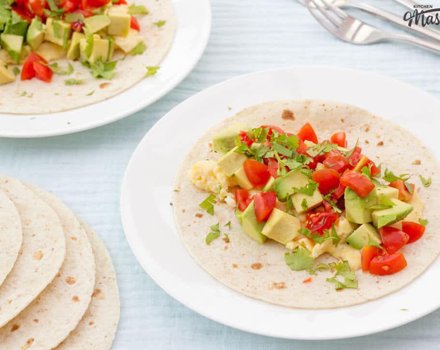 step 4 Now you’re ready for assembly! Place the Small Flour Tortillas (4) on plates and divide the egg between them. Add Salt (to taste) and Simply Organic® Black Pepper (to taste). Top with the chopped avocado and tomato then sprinkle all over with the Fresh Cilantro (2 Tbsp). Wrap up.