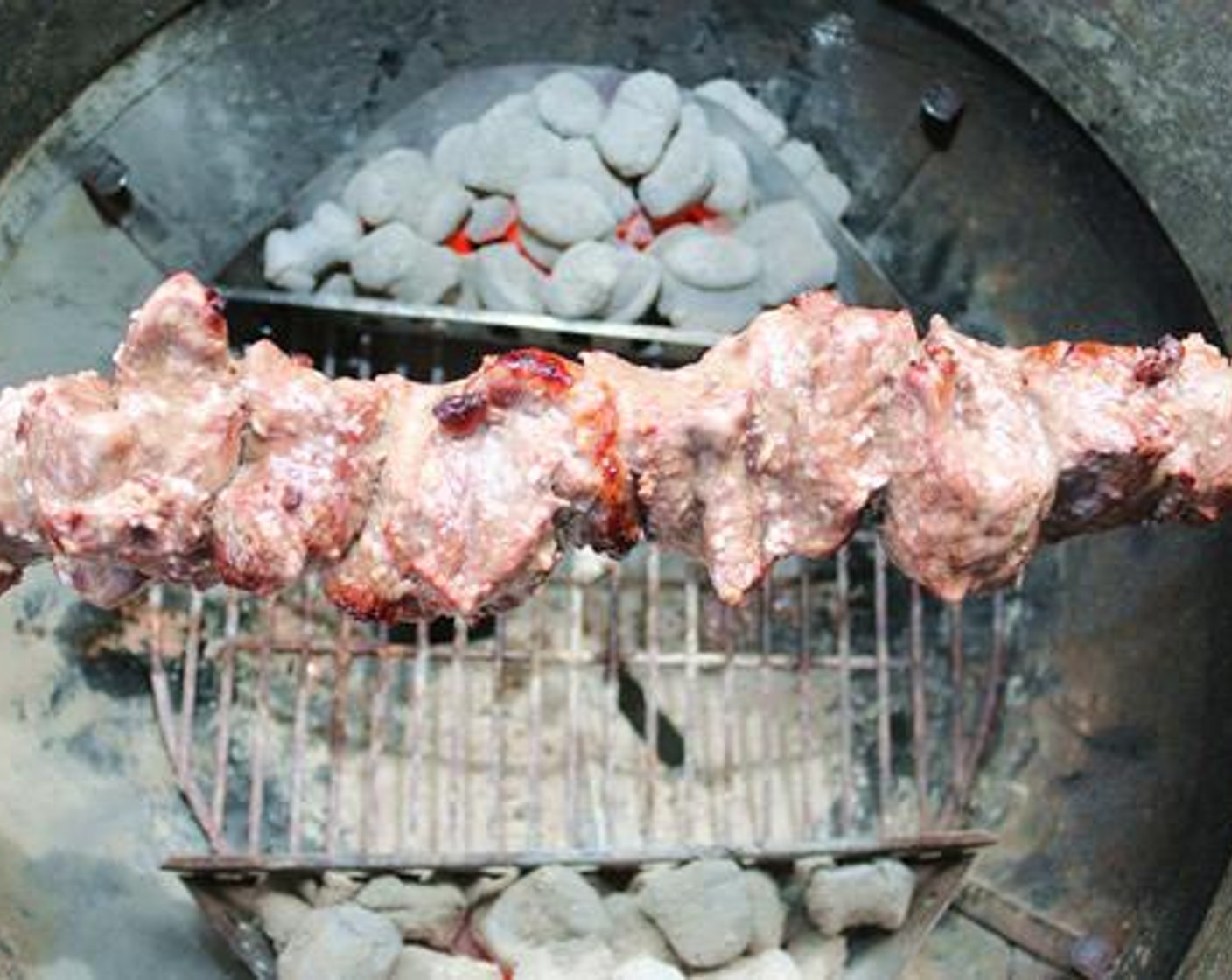 step 5 Season all sides with Coarse Sea Salt (2 Tbsp) and place rod into the rotisserie motor.