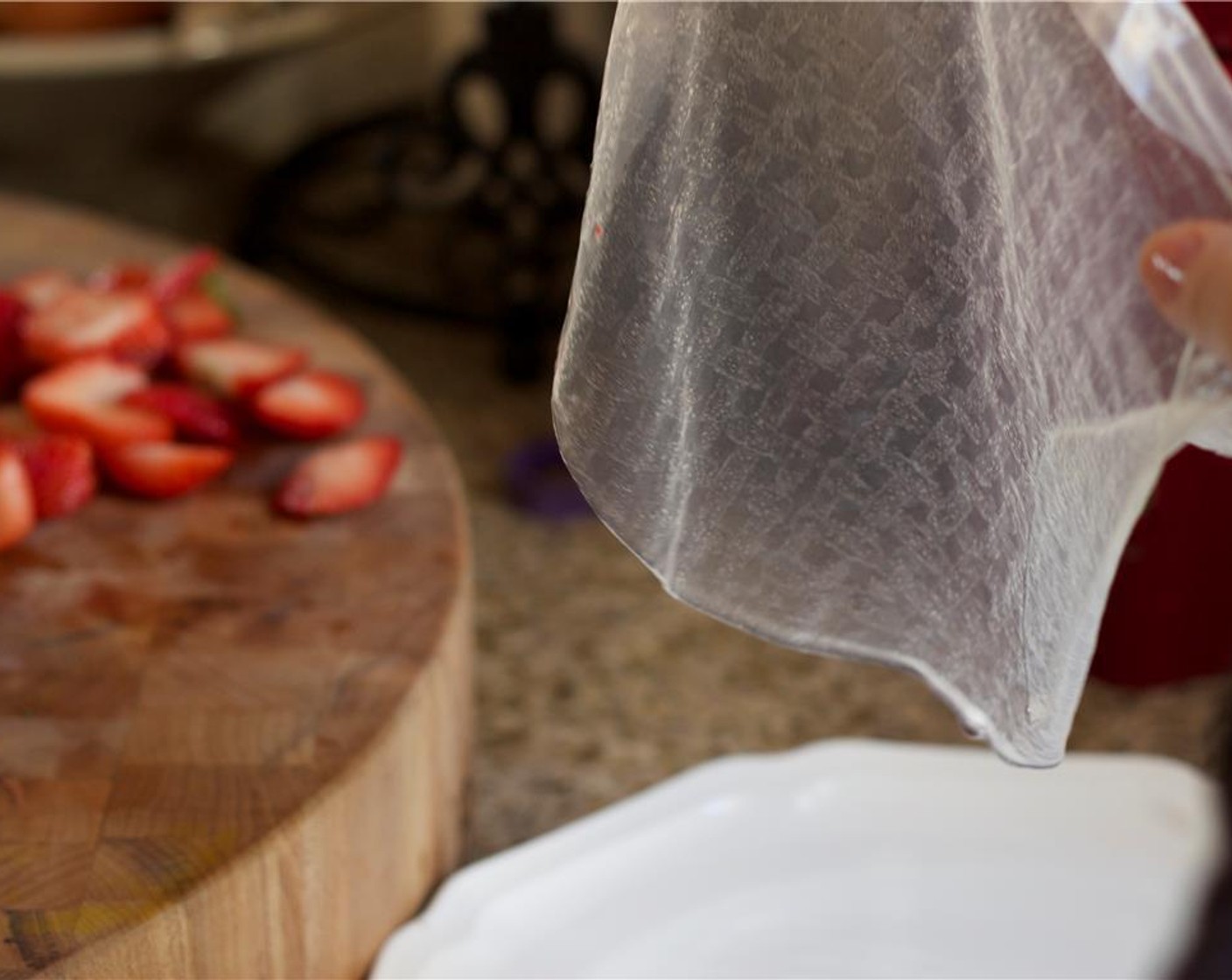 step 3 Fill 9-inch pie plate with warm water. Dip one of the Rice Paper Wrappers (8) into water for 5 to 10 seconds or until pliable; pat dry with tea towel and carefully place on work surface.