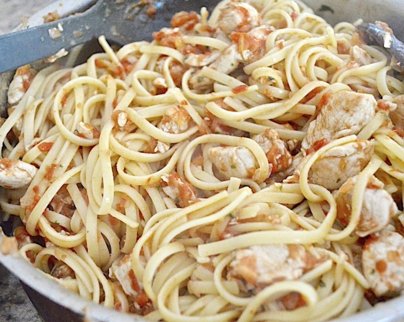 step 5 Drain the pasta and toss it with the chicken and sauce. Stir in the Grated Parmesan Cheese (4 Tbsp) and Butter (1 Tbsp) to give it a nice finish.