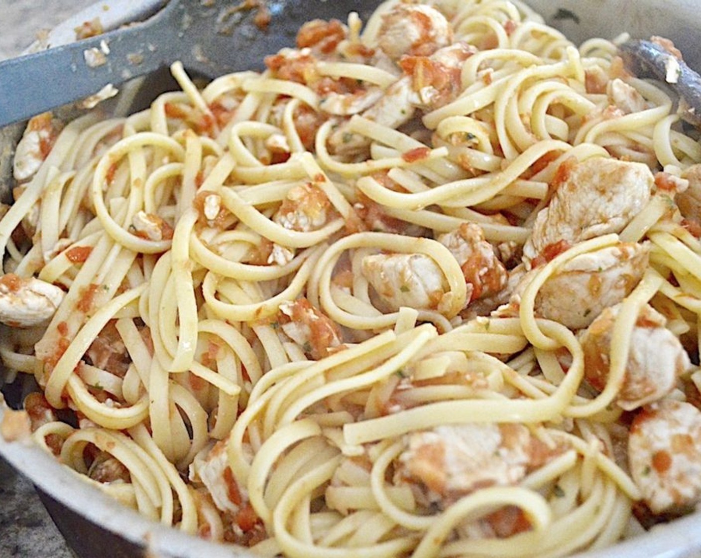 step 5 Drain the pasta and toss it with the chicken and sauce. Stir in the Grated Parmesan Cheese (1/4 cup) and Butter (1 Tbsp) to give it a nice finish.