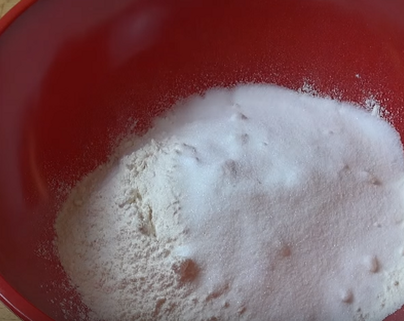 step 1 To a big mixing bowl, add Self-Rising Flour (2 cups), All-Purpose Flour (1/2 cup), Caster Sugar (3/4 cup). Mix together with a wooden spoon.