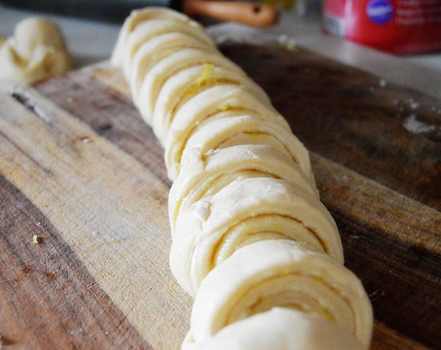 step 9 Roll dough tightly lengthwise. Cut into 12 pieces.