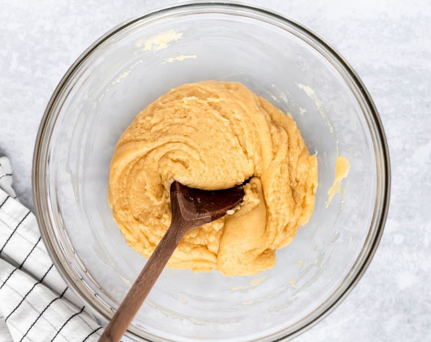 step 2 In a medium mixing bowl, combine the Yellow Cake Mix (1 box), Egg (1), and Unsalted Butter (1/2 cup) for the crust. Set 1 cup aside.