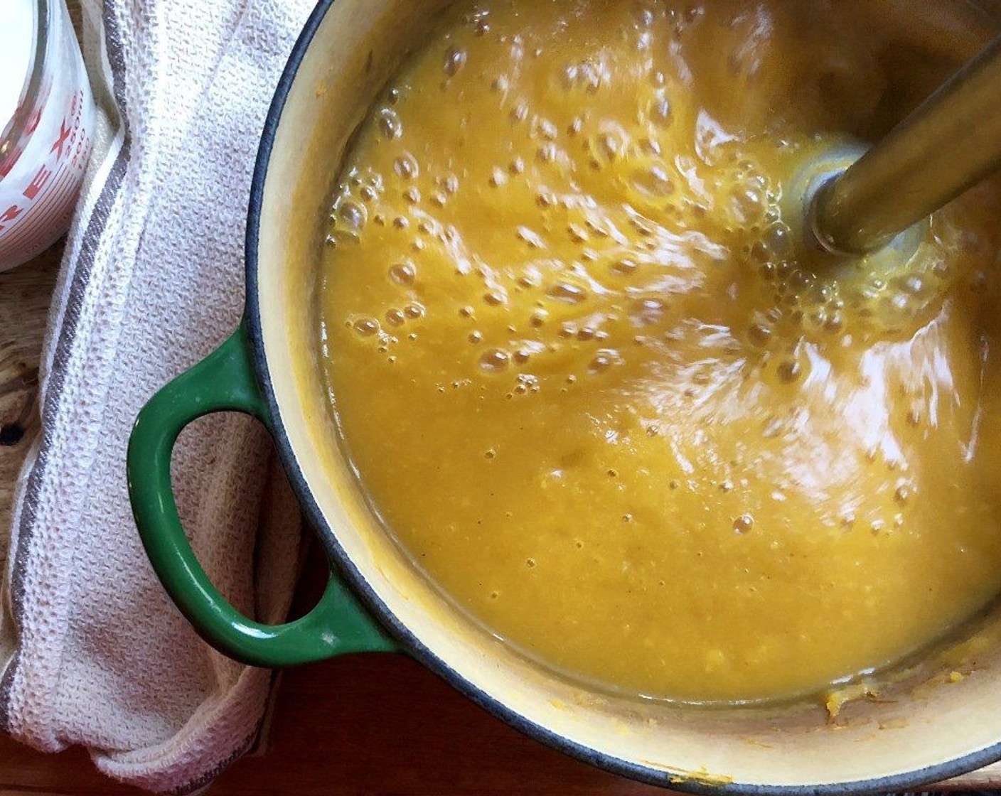 step 8 Stir in roasted squash. Reduce heat; simmer for 15 minutes. Use an immersion blender to make the soup smooth.  Alternately, place the soup in the bowl of your food processor or blender; process until smooth. Add 2% Reduced Fat Milk (1 cup) and season with salt and pepper if needed. Set aside.
