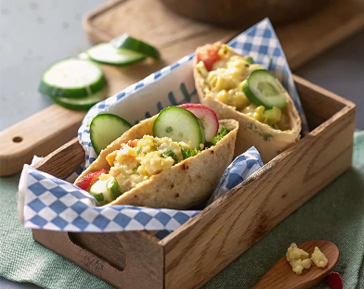 step 2 Fill each Whole Wheat Pita Bread (4) half with 1/3 cup egg mixture; top with Cucumbers (2), Red Onion (1) and Alfalfa Sprouts (1/2 cup), if desired.