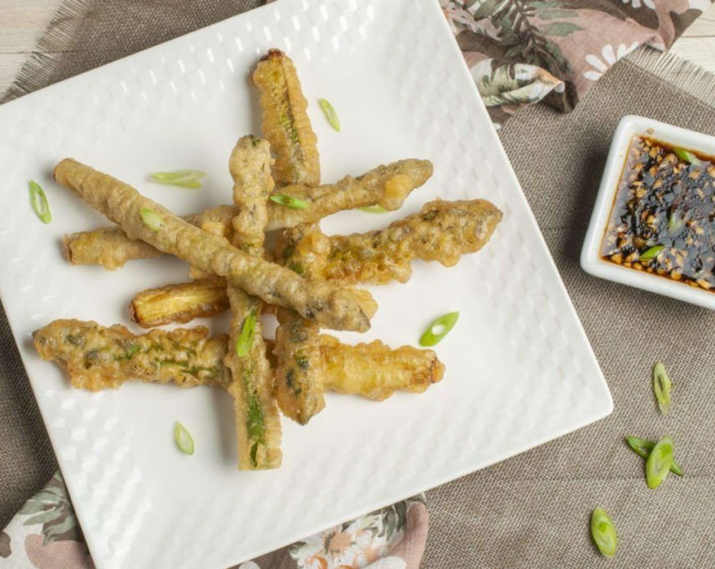 step 7 Divided soy dipping sauce into small serving bowls and serve asparagus alongside. Garnish with Scallion (1/4 cup) and serve immediately.