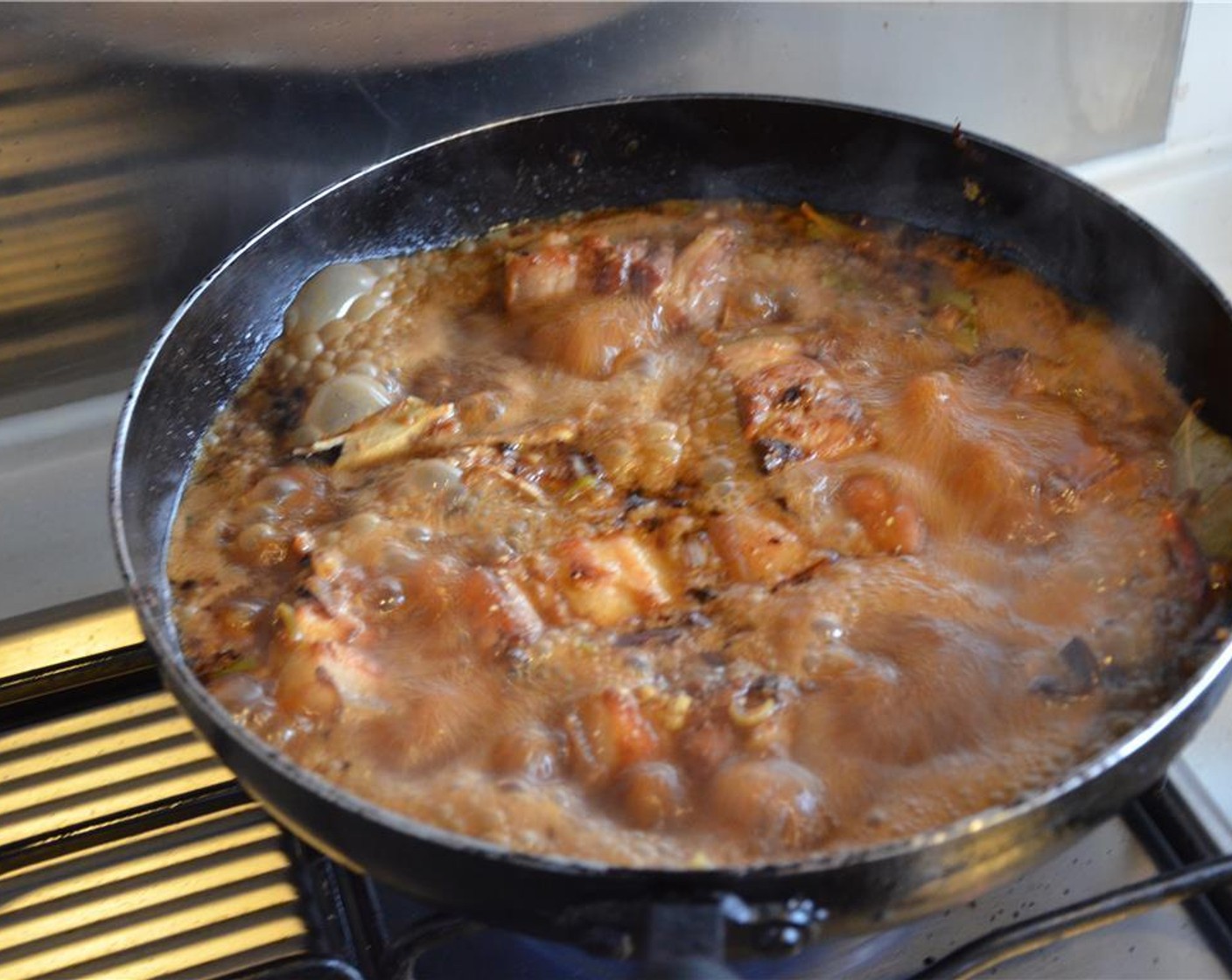 step 10 Add the Root Beer (12 fl oz), Water (1 cup), Bay Leaves (2), and the pods of Star Anise (2). Bring to a boil. Reduce heat to medium-low, cover, and simmer until pork is tender about 40–50 minutes.