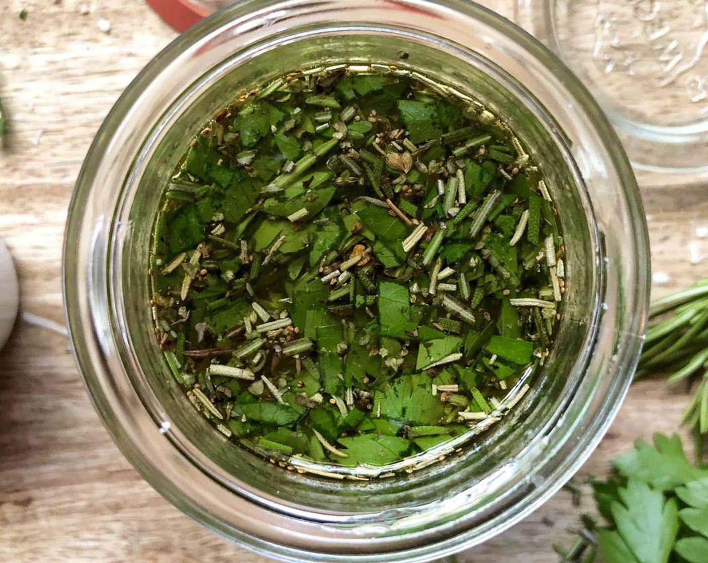 step 1 Combine Parmesan Cheese (2 Tbsp), Fresh Parsley (1 Tbsp), Fresh Rosemary (2 tsp), Italian Seasoning (1 tsp), Crushed Red Pepper Flakes (1/8 tsp), Ground Black Pepper (1/8 tsp) and Salt (1/8 tsp) in a small jar. Pour Extra-Virgin Olive Oil (2/3 cup) over the top and stir to mix well.