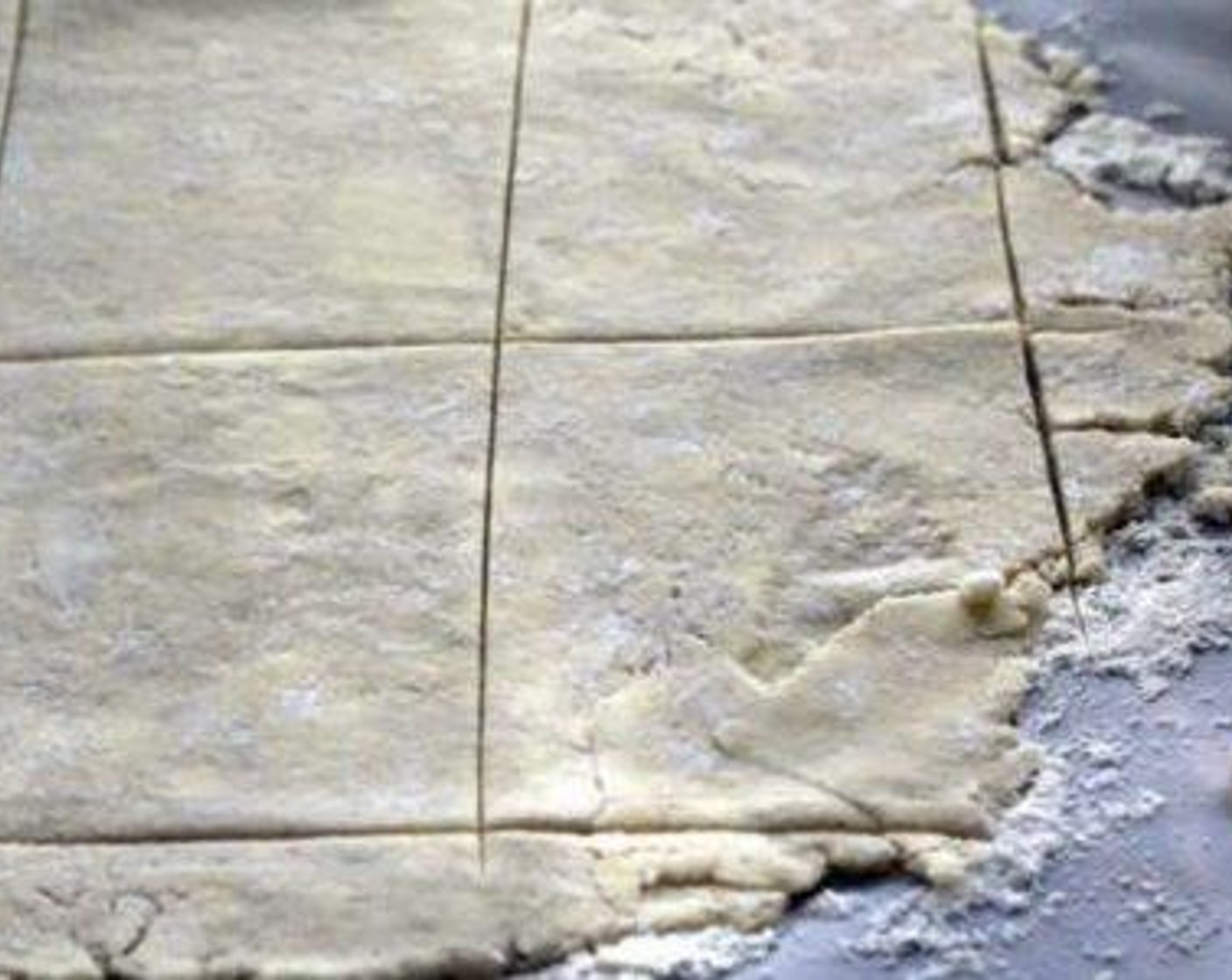 step 5 On a lightly floured surface, roll the prepared cornmeal crust until thin like you would use for a traditional pie. Cut into even rectangles.