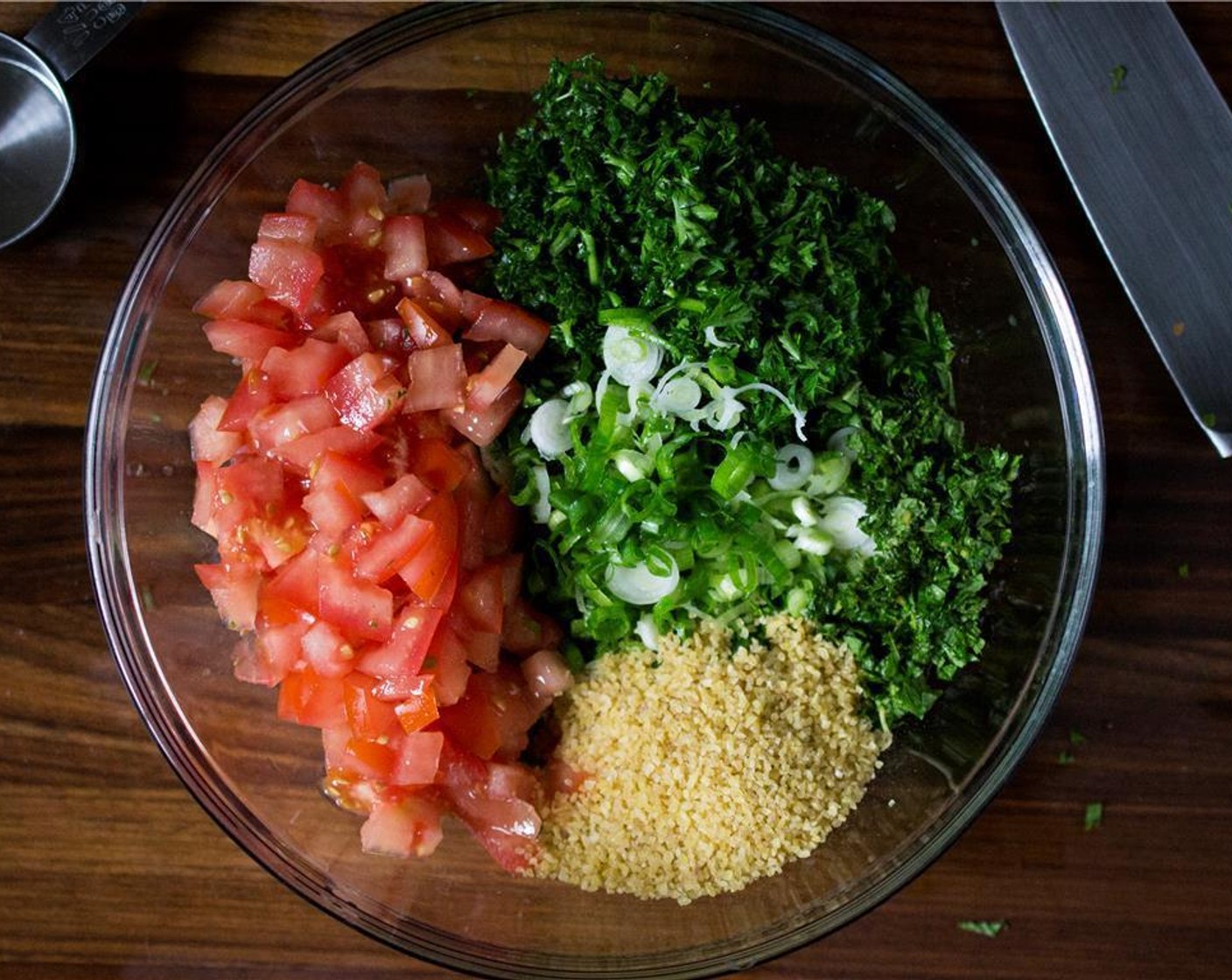 step 1 In a large bowl, combine the Fresh Parsley (2 1/2 cups), Tomato (1 cup), Scallion (1/3 cup), Fresh Mint (2 Tbsp), and Bulgur Wheat (1/4 cup) and mix well. Cover and refrigerate for 2 hours – allowing the bulgur to expand.