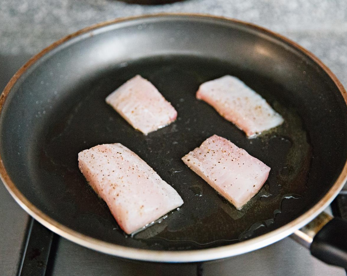 step 8 Fry the snapper until both sides are cooked.