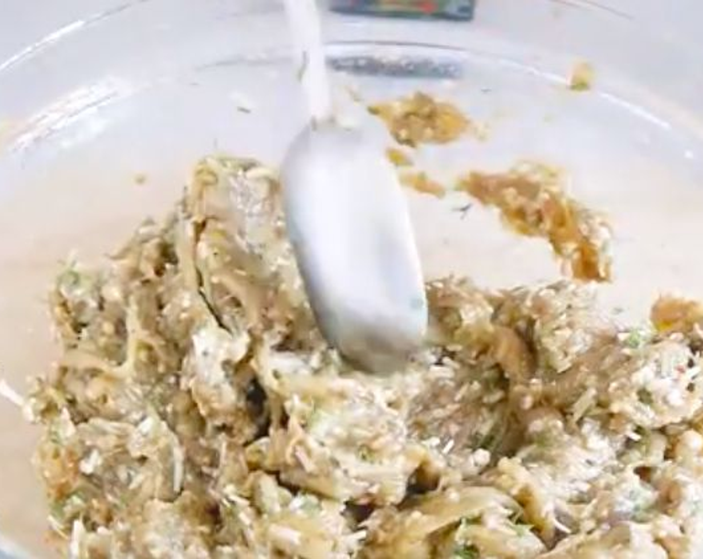 step 5 Place the eggplant pulp in a strainer and squeeze out all the liquid.