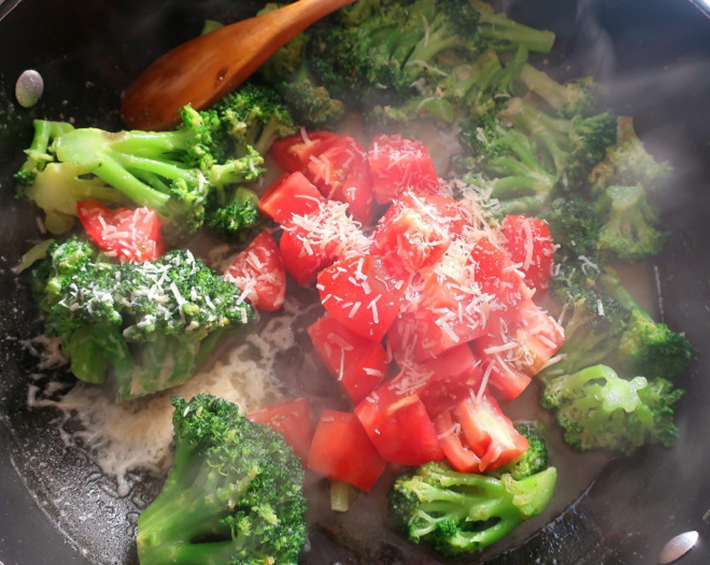 step 8 Saute broccoli and Tomato (1) in Butter (1/2 stick) until heated through. Season with Kosher Salt (to taste) and Ground Nutmeg (to taste). Add Asiago Cheese (1 Tbsp).