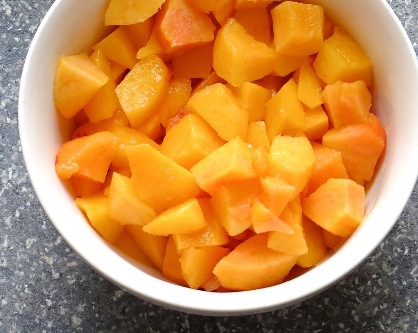 step 5 Preheat oven to 400 degrees F (200 degrees C). Line two baking sheets with parchment paper and set aside. Peel, pit and prepare the Peaches (1 1/2 cups).