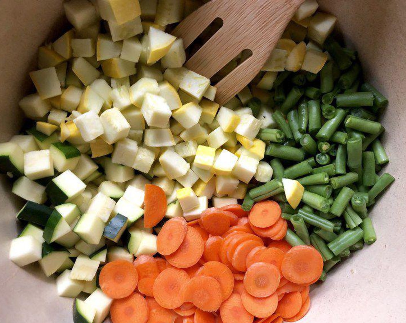 step 3 Stir in Zucchini (3 cups), Yellow Squash (3 cups), Carrot (1 cup), and Green Beans (1 cup). Cover pot and allow to simmer over medium heat for 10 minutes or until vegetables are al dente. Remove from heat.