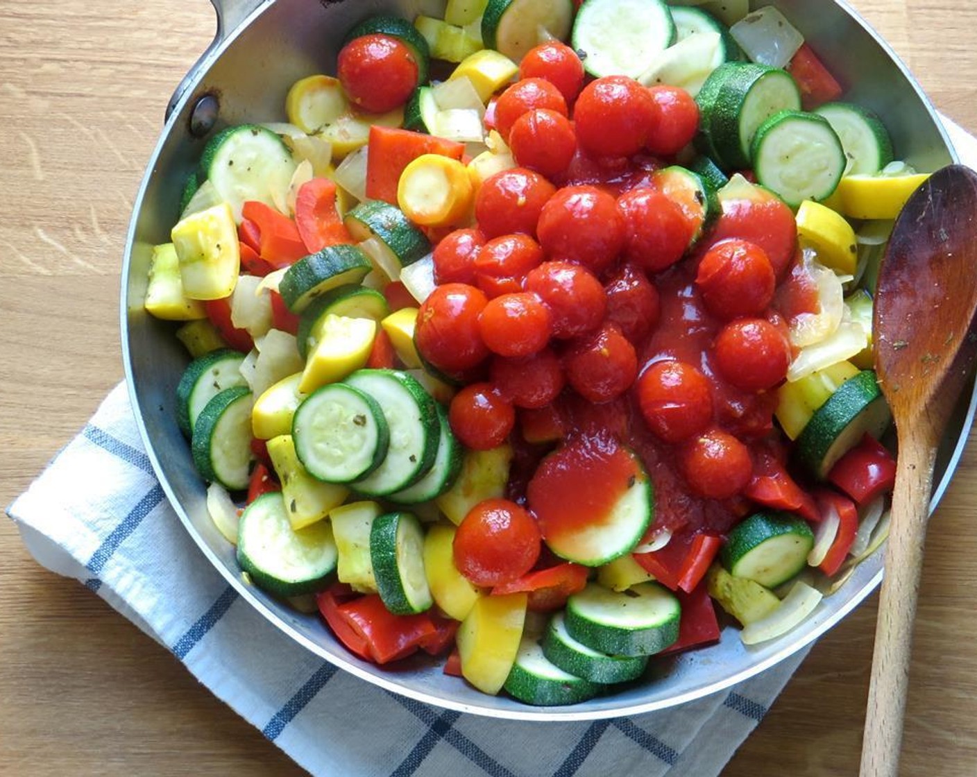 step 5 Add the zucchini, squash and Kosher Salt (1/2 tsp). Stir to combine and place a tight fitting lid on the pan.  Cook 5 to 7 minutes, stirring occasionally until vegetables have softened slightly.