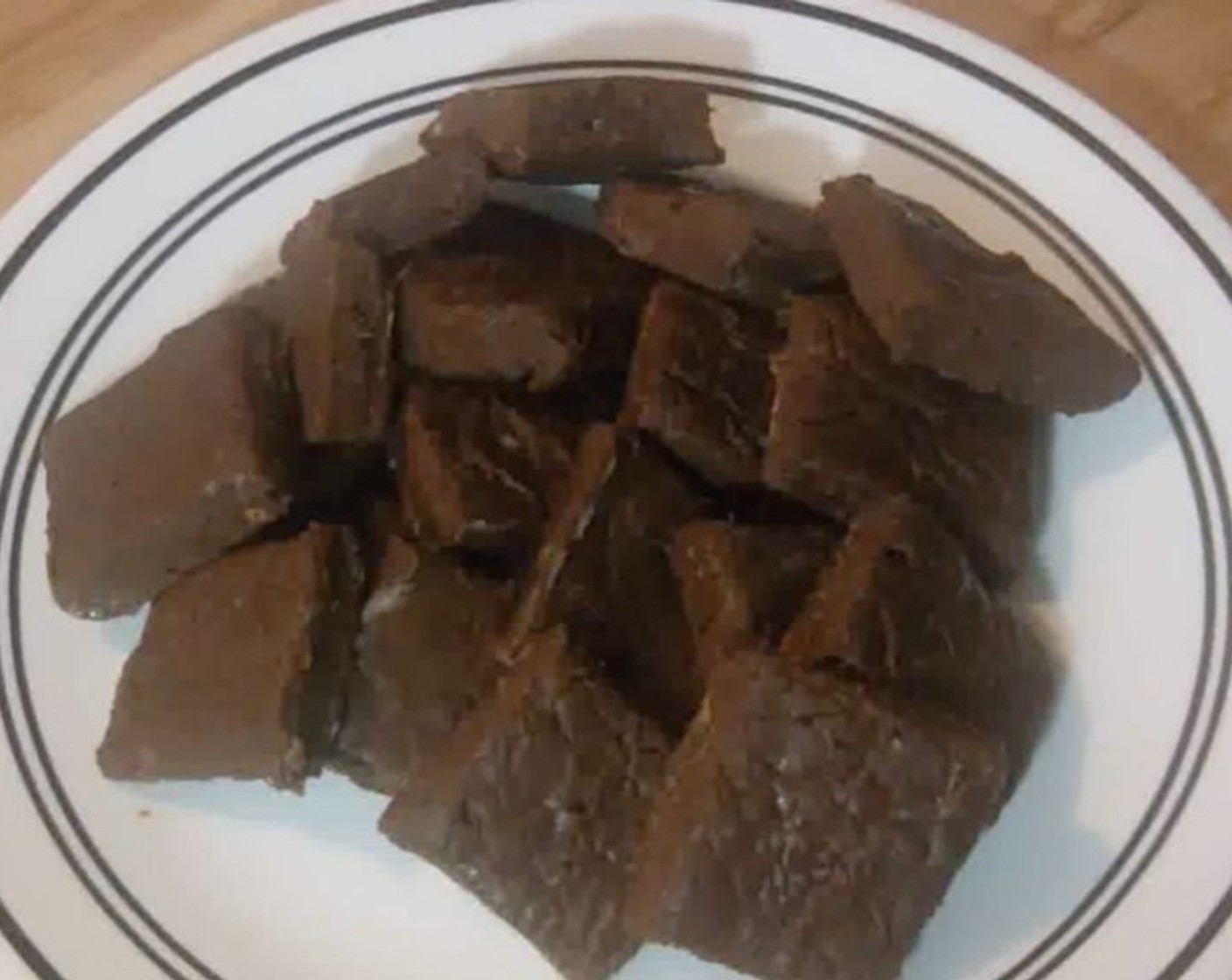 step 5 Remove the lining with the fudge from the pan. Slice the fudge into squares.