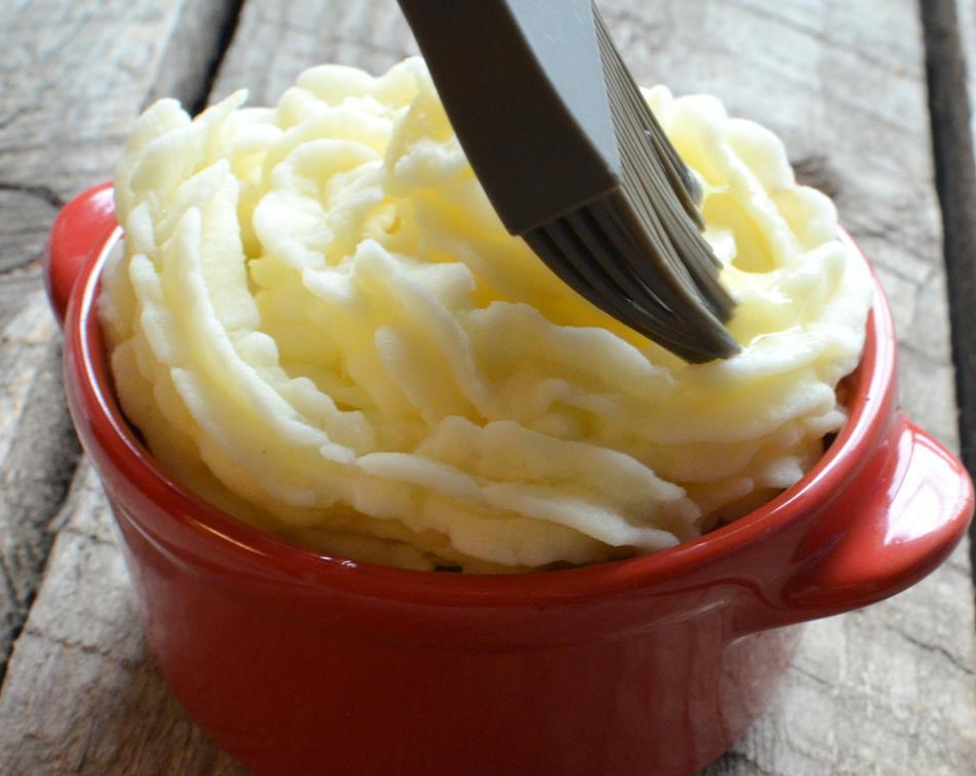 step 12 Lightly brush a little Egg (1) wash on the ridges of the mashed potatoes.