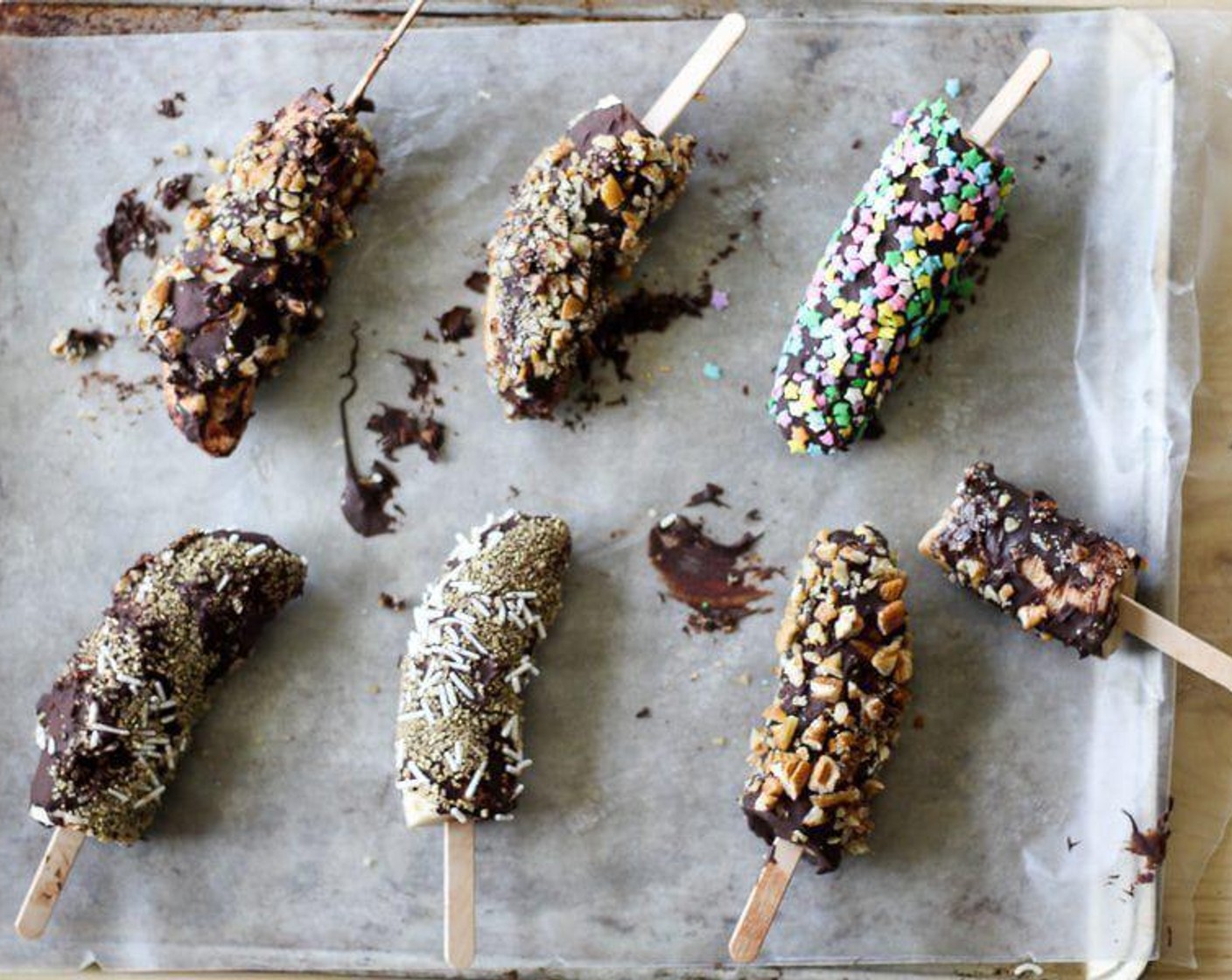 step 6 Transfer the dark chocolate banana pop to a dish or pan covered in wax paper. Place in the freezer for 2 - 3 hours until they are frozen solid.