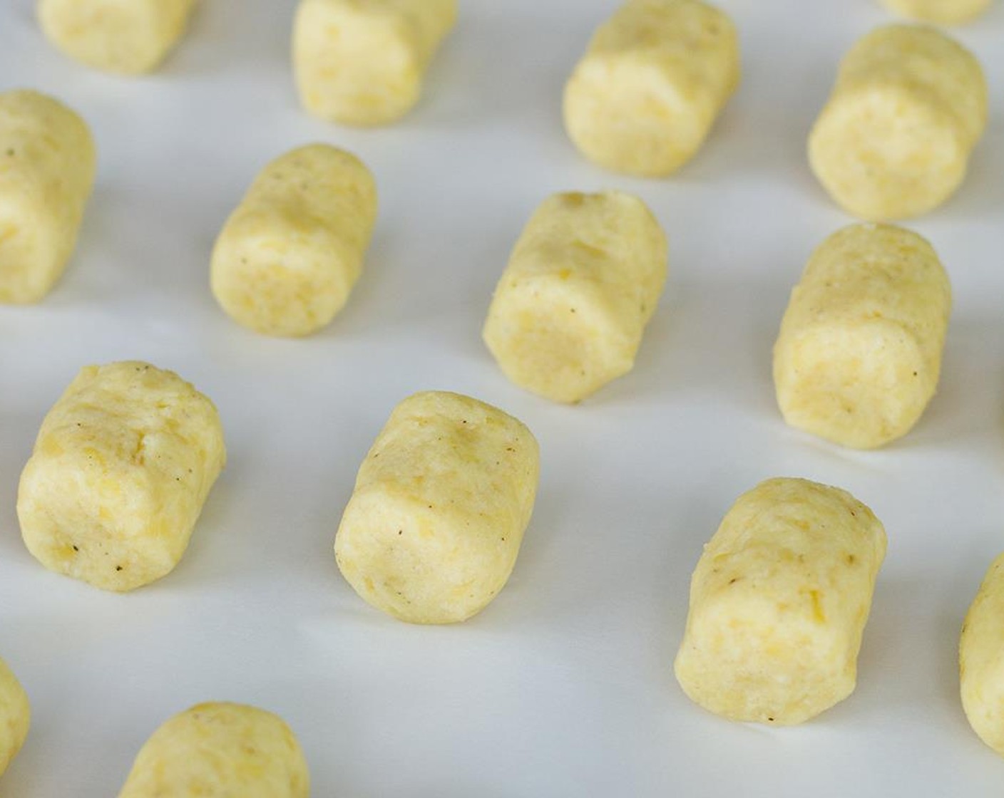 step 7 1 tablespoon at a time, shape the tater tots with your hands, and place on a baking sheet lined with parchment paper. Repeat until all the sweet potato mixture is used up.