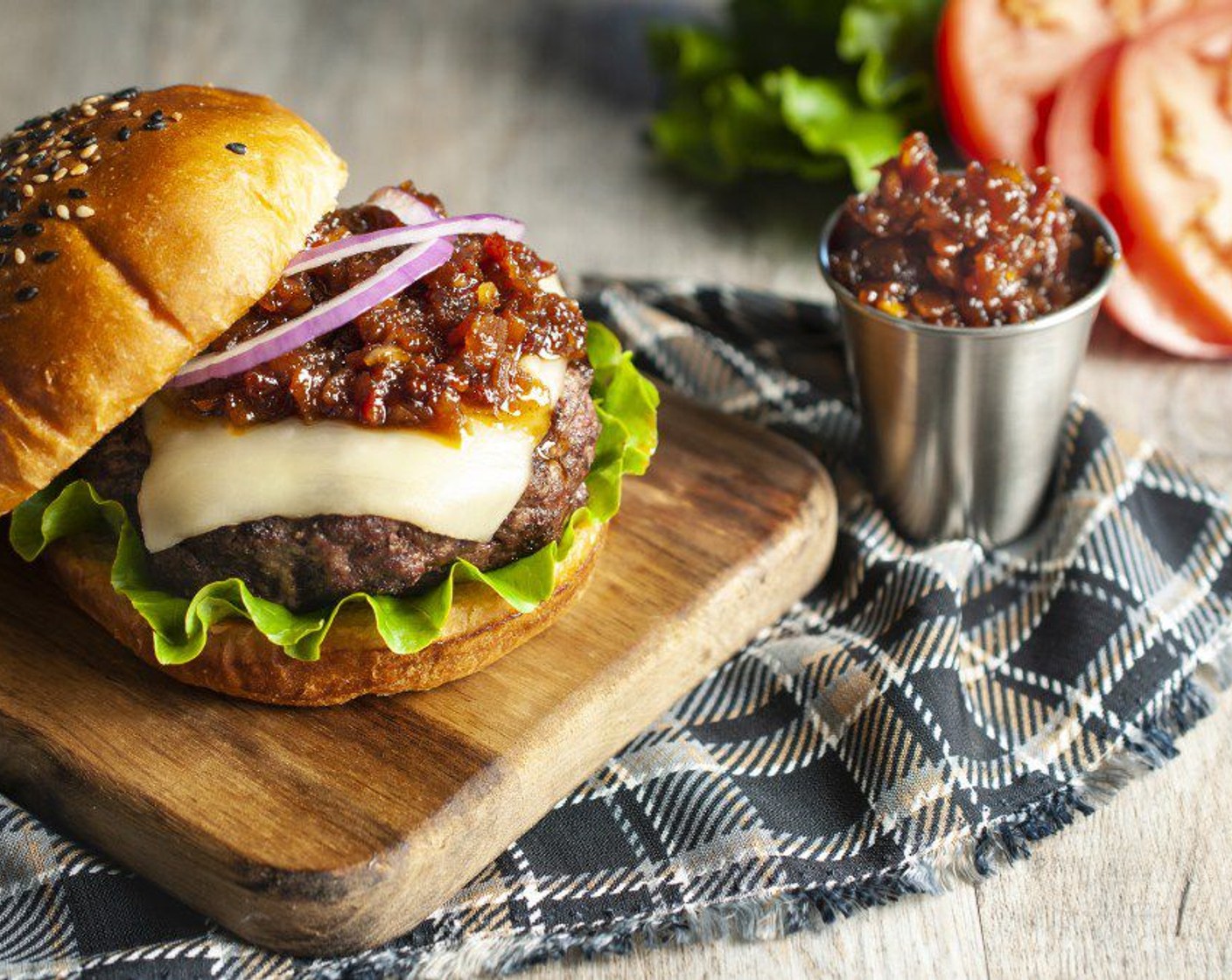 step 14 While burgers are resting, toast Hamburger Buns (4) and warm bacon jam. Assemble burgers with bacon jam and other toppings as desired and serve immediately.