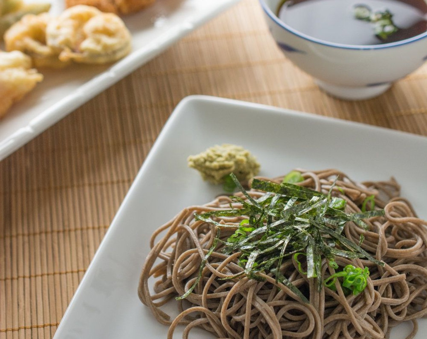 step 7 Garnish with shredded Nori Sheet (1 sheet) and Scallion (1/2 cup). Serve with the chilled broth and enjoy!