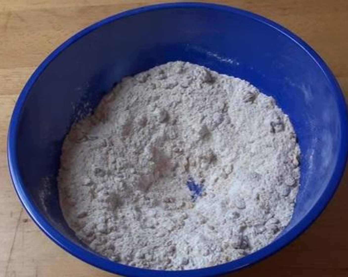 step 2 In a mixing bowl, add the Self-Rising Flour (2 cups), Brown Sugar (3/4 cup), Simply Organic Cinnamon, Ground (1 tsp), and Granola (1 cup). Mix everything together until well combined.