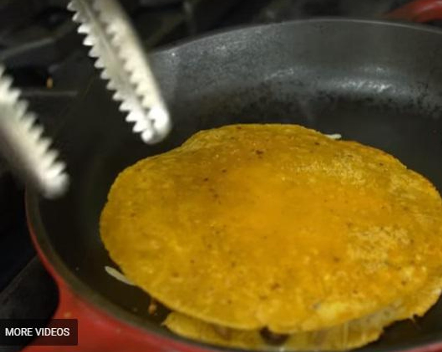 step 4 Place the ¼ of the rest of the cheese on the top and put 2nd tortilla (the other one that was heated) on top.