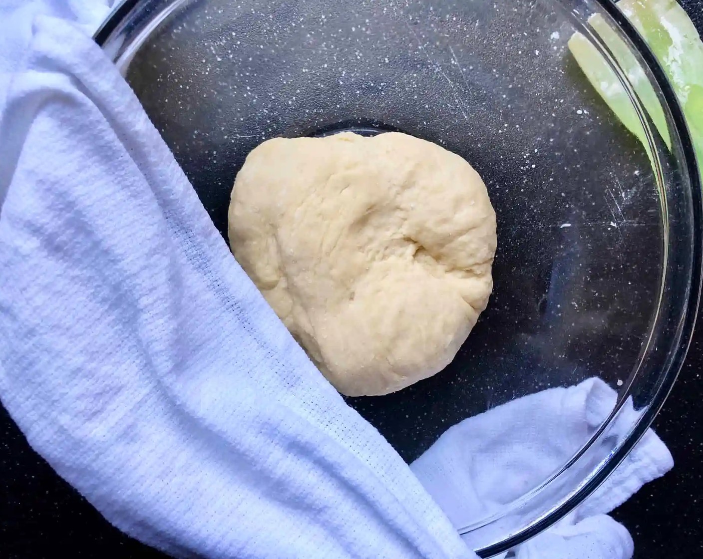 step 5 Cover the dough with a damp towel and let it rest for about 1 hour. Letting the dough rest will make it easier to roll thin wrappers.