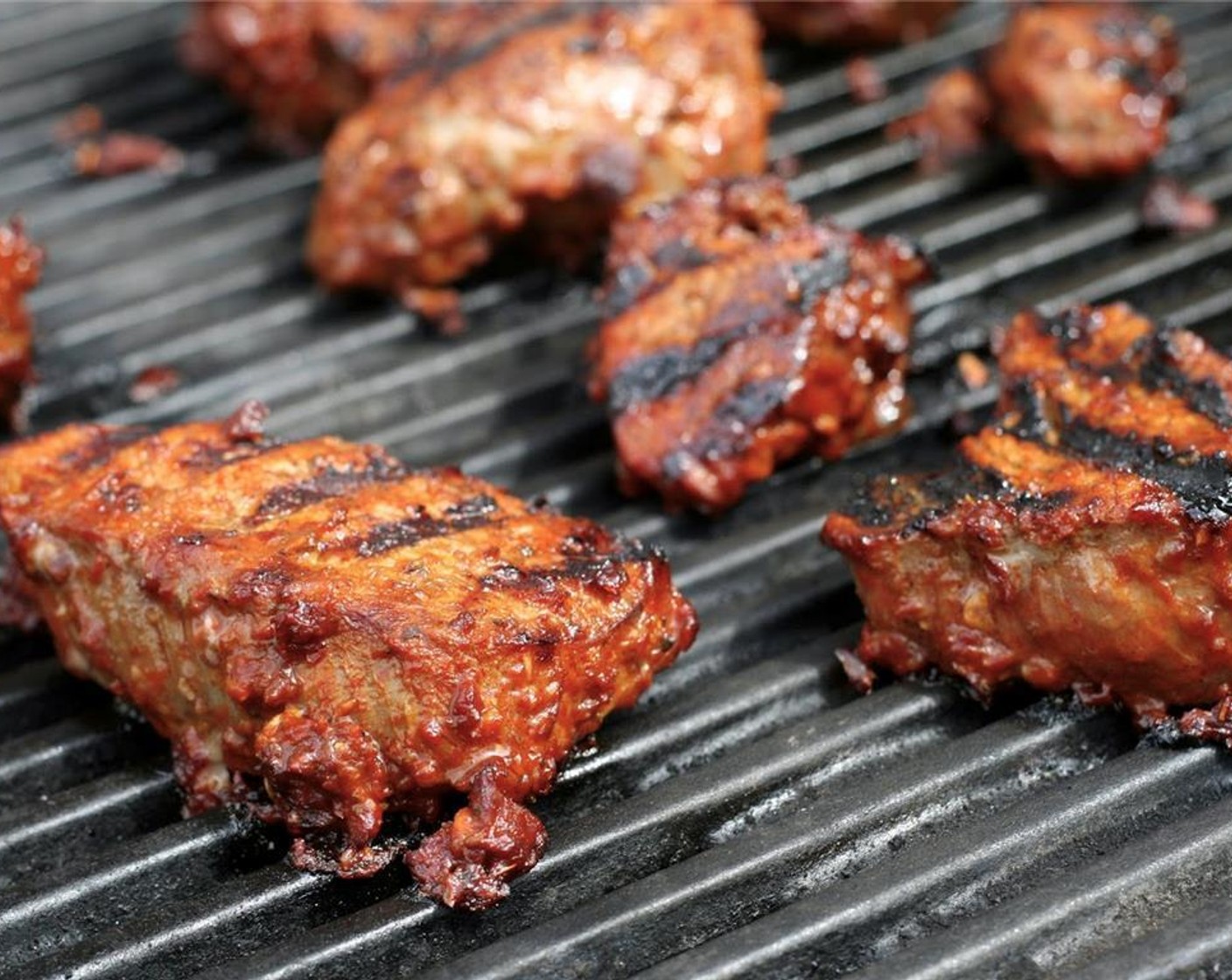 step 4 Preheat grill to medium-high. Wipe marinade off steak or chicken and grill until cooked to your liking, flipping once. Allow meat to rest a few minutes before cutting into bite-sized pieces.