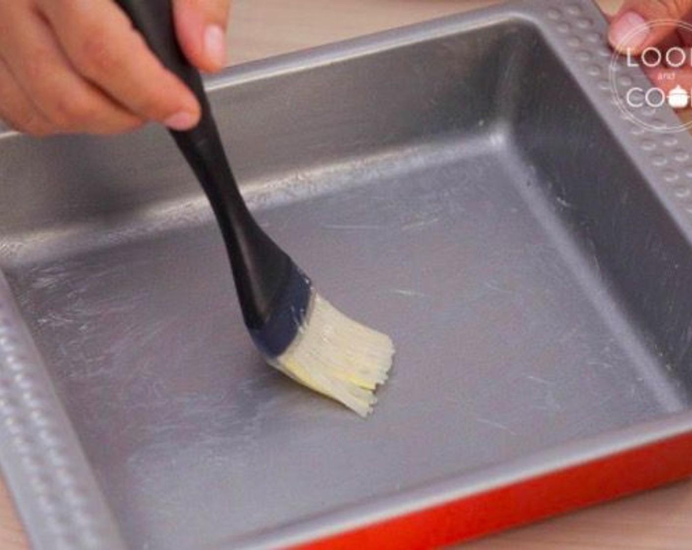 step 8 Prepare tin by brushing with melted butter.